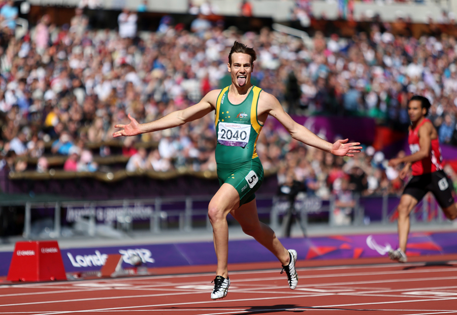 Australia's Evan O'Hanlon celebrates winning the Gold Medal for the Men's 200m