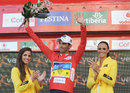 Alberto Contador stands on the podium