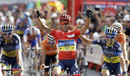 Alberto Contador celebrates as he crosses the line