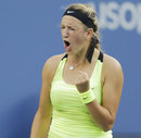 Victoria Azarenka celebrates winning a point against Serena Williams