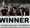 New Zealand team poses with the winners' trophy