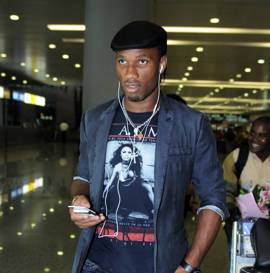 Didier Drogba arrives at the airport