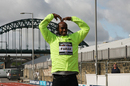 Mo Farah does the 'Mobot' in Newcastle
