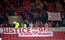 Liverpool fans display banners 
