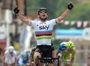 Mark Cavendish celebrates winning stage eight