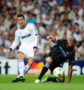 Cristiano Ronaldo shoots after skipping past Vincent Kompany