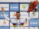 Tony Martin celebrates after winning the individual time trial