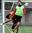 Luis Suarez and Fabio Borini compete for the ball during a training session