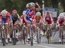 Lucy Garner clenches her fist after winning the junior women road race 