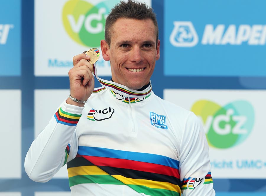 Philippe Gilbert stands on the podium after winning the men's elite road race
