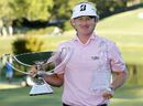 Brandt Snedeker poses with trophies after winning The Tour Championship and FedEx Cup 