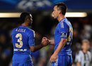 John Terry shakes hands with Ashley Cole