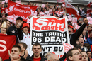 Liverpool fans make reference to the front page article of the Sun that vilified Hillsborough fans