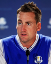 Ian Poulter talks to the press