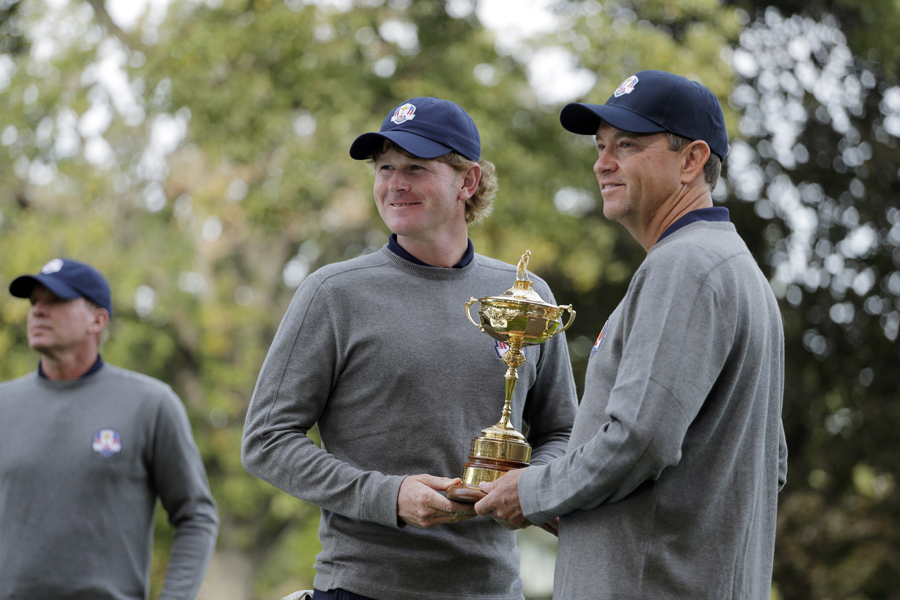 Brandt Snedeker poses with Davis Love III and the Ryder Cup