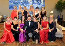 Jose Maria Olazabal poses with the players' wives and girlfriends