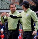 Graeme McDowell and Rory McIlroy congratulate each other