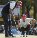 Phil Mickelson and Keegan Bradley line up a putt