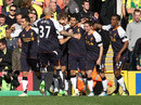Liverpool celebrate Luis Suarez's early strike