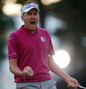 Ian Poulter reacts to a birdie putt