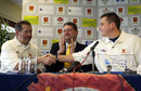 Darren Gough shakes hands with Graham Gooch as David East looks on