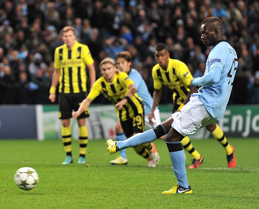 Mario Balotelli scores the equaliser from the penalty spot