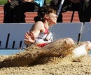 Kelly Sotherton lands in the sand during the women's heptathlon