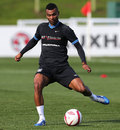 Ashley Cole takes part in an England training session