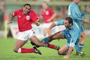 Paul Ince and Fuerra battle for the ball