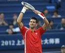 Novak Djokovic celebrates winning against Grigor Dimitrov