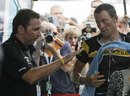 Johan Bruyneel chats to Lance Armstrong 