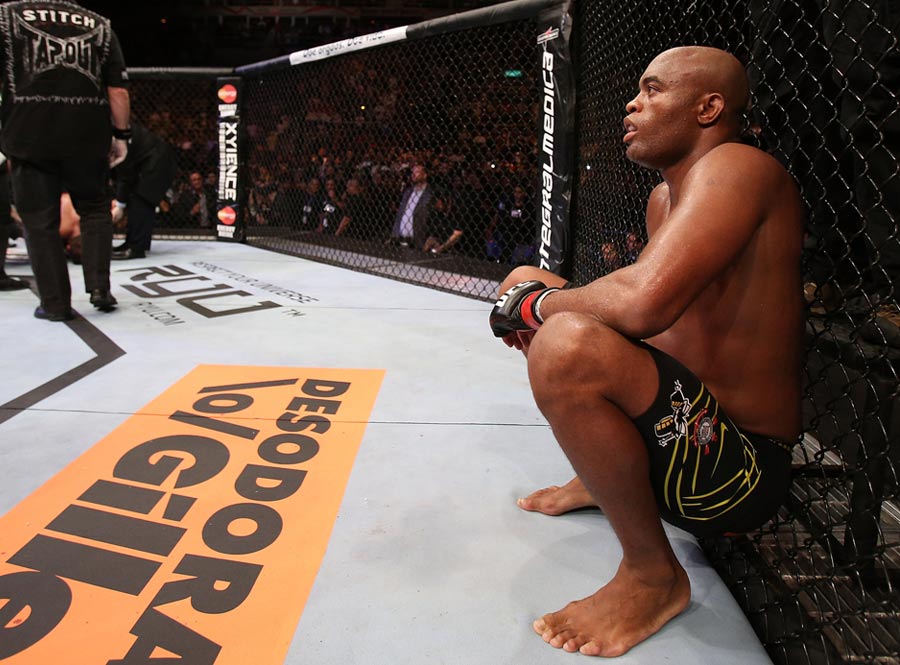 Anderson Silva sits in his corner after his TKO victory over Stephan Bonnar