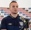 Tom Cleverley addresses the media