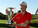 Jonas Blixt poses with the winner's trophy
