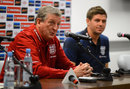 Roy Hodgson and Steven Gerrard attend a press conference