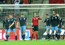 England players stand dejected after Kamil Glik's equaliser