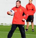Brendan Rodgers laughs during training