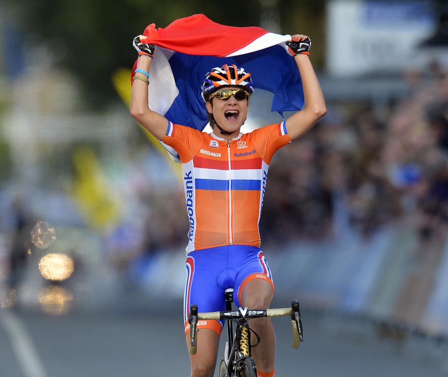 Marianne Vos celebrates after crossing the finish line