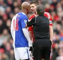 Alan Wiley separates El-Hadji Diouf and Steven Gerrard 