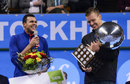 Jo-Wilfried Tsonga and Tomas Berdych laugh during the trophy presentation
