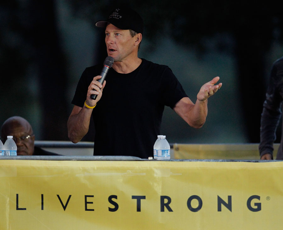 Lance Armstrong addresses cyclists at the Livestrong Challenge Ride