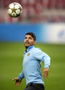 Sergio Aguero sets up for a header during Manchester City training