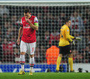 Thomas Vermaelen trudges away after Arsenal concede a goal