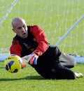 Pepe Reina makes a save during a training session