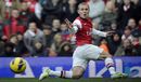 Jack Wilshere stretches to play a pass
