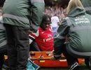 Gervinho is carried off the pitch after sustaining an injury 