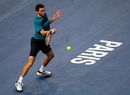 Gilles Simon lines up a forehand