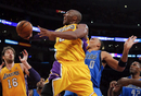 Kobe Bryant adjusts for the lay-up
