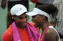 Serena Williams chats to her sister Venus Williams