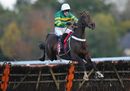 My Tent Or Yours, ridden by Tony McCoy, clears a hurdle